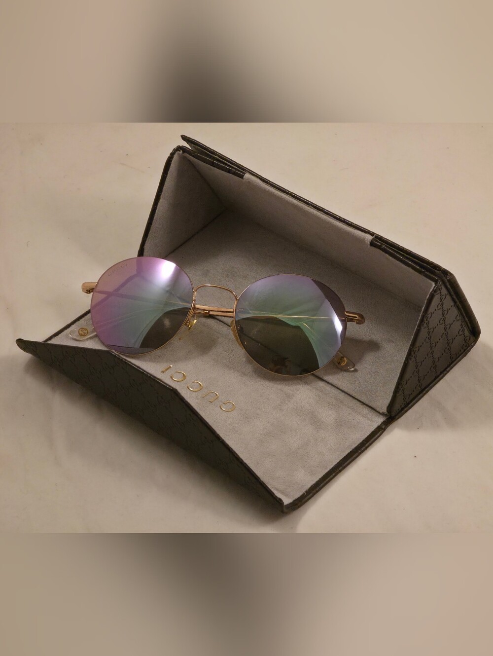 Gucci Gold Frame Round Sunglasses with Iridescent Lenses